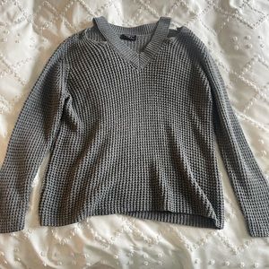 Gray knit sweater with shoulder cut outs